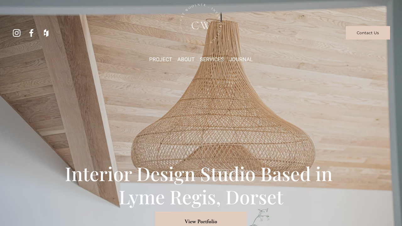 CAT WOOLNER INTERIOR DESIGN LTD website preview